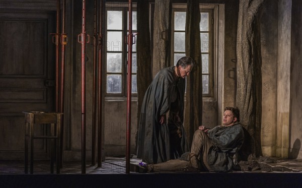 BERLIN, Germany - January 2024: Written on Skin - Opera in three parts by George Benjamin in a production by Katie Mitchell. Text by Martin Crimp after the anonymous Occitan text Guillem de Cabestanh - Le cœur mangé from the 13th century World premiere on 7 July 2012 at the Grand Théâtre de Provence in Aix-en-Provence. Media rehearsal on 23 January 2024 at the Deutsche Oper in Berlin Performers: Protector: Mark Stone Agnès: Georgia Jarman First Angel / The Boy: Aryeh Nussbaum Cohen Second Angel / Marie: Anna Werle Third Angel / John: Chance Jonas-O'Toole, Berlin