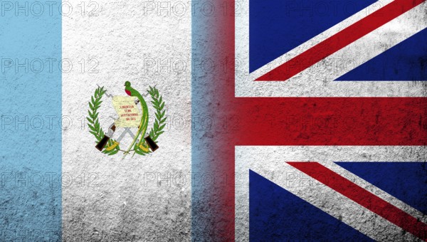 National flag of United Kingdom (Great Britain) Union Jack with Guatemala National flag. Grunge background
