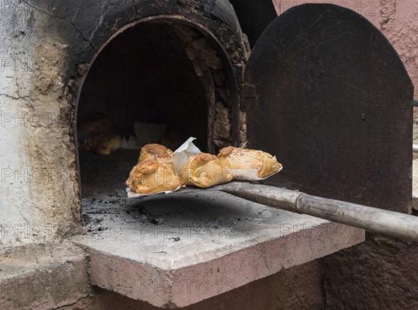 Traditional Cypriot easter pastries made with mixture of various cheese and halloumi and cooked on a clay oven, called flaounes