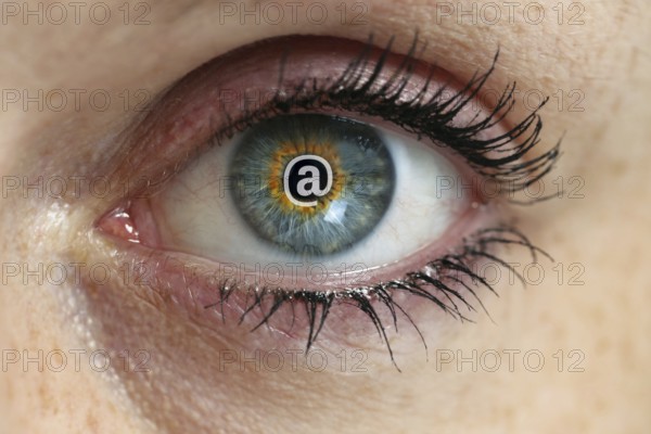 Eye with email sign in the pupil concept