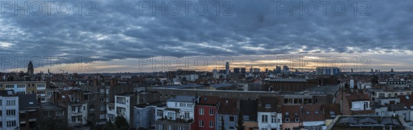 Jette, Brussels Capital Region, Belgium, 01 24 2020 Extra large panoramic view over the skyline of North, West and Central Brussels during sunrise, Europe