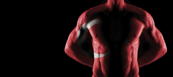 Turkey flag on muscled male torso with abs, black background