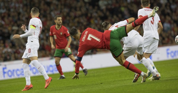 Football match, captain Cristiano RONALDO CR7 Portugal centre has just been fouled and goes down, sequence 2, Estadio do Dragao, Porto, Portugal, Europe