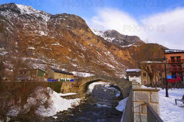 Benasque medieval bridge over Esera River in Huesca Spain