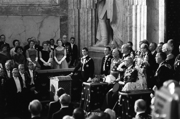 Carl XVI Gustaf, King of Sweden. Born 30 april 1946. Pictured when attending the ceremonial opening of the swedish parliament 1966. King Gustaf VI Adolf in the center sitting in a throne, from where he made his speach to the parliament