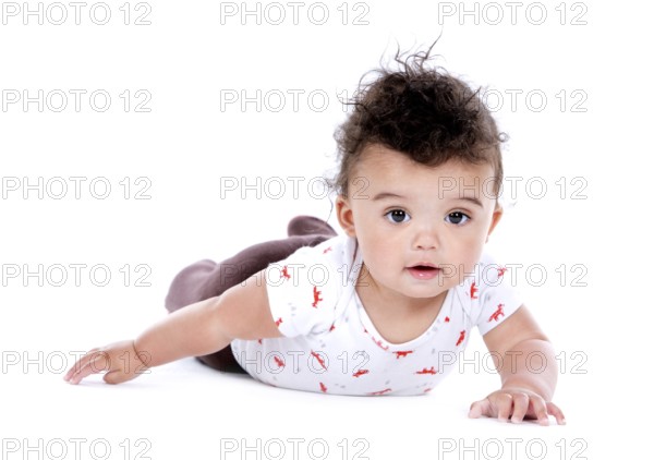 Adorable baby boy wrapped with blanked on white background, Toronto, Canada, North America