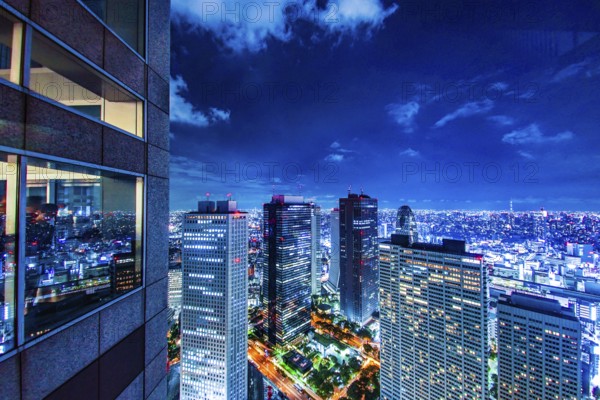 Tokyo night view seen from the observation deck of the Tokyo Metropolitan Government Building. Shooting Location: Tokyo metropolitan area