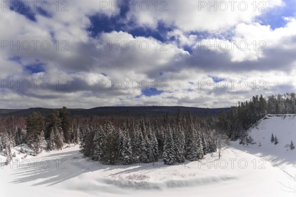 Left over from the ice-age, Big Bend is a geological feature where the Big East River encircles an outcropping of trees, located inside of Arrowhead Provincial Park, Huntsville, Ontario, Canada, North America