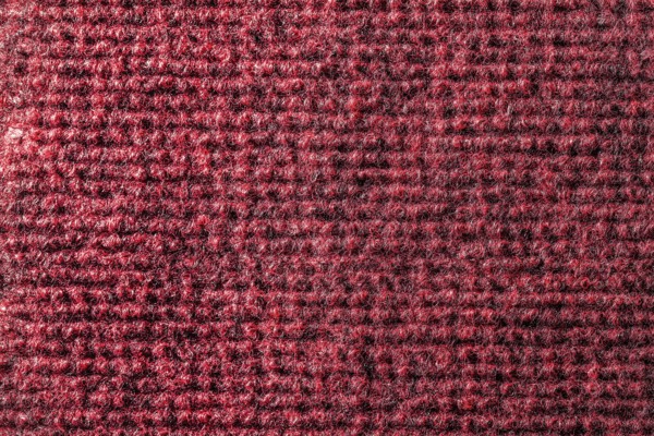 Red kitchen sponge texture vertical view