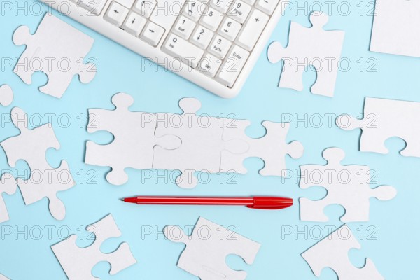 Building An Unfinished White Jigsaw Pattern Puzzle With Missing Last Piece