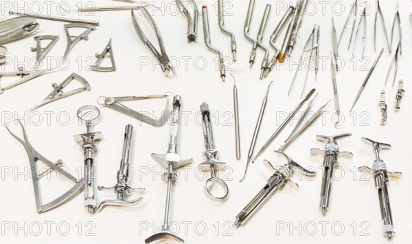 Dental instruments for stomatology practice. Tweezer, carver, wiper, drill, pincers, scraper, remover