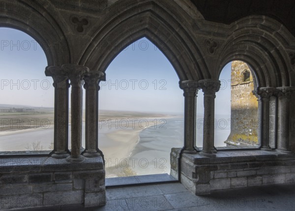 Mont-Saint-Michel, monastery hill, early Gothic cloister 1225-1228, late Romanesque - early Gothic now glazed viewing gate LES 3 ARCHES on the mudflats, St., Saint, Saint
