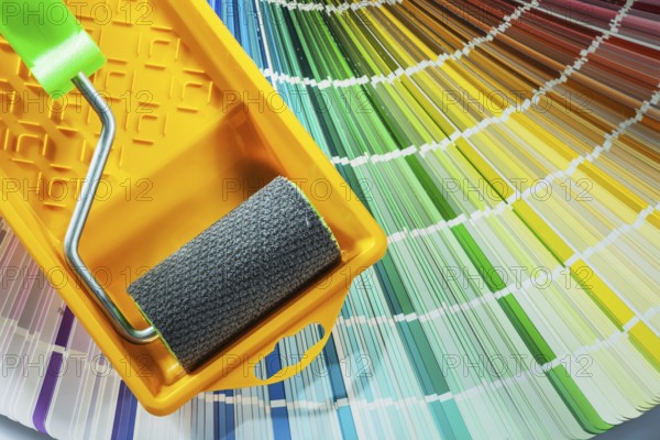 Paint roller tray color sampler on white background