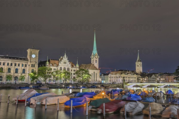 Zurich Switzerland, night city skyline at Fraumunster Church and Munster Bridge
