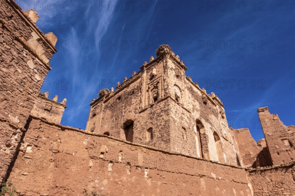 An old kasbah that served as a base for nomadic tribes, with a sense of ruggedness and adventure