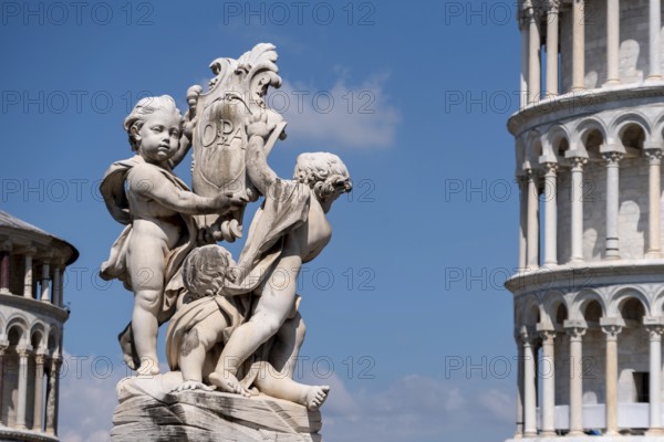Sculpture at the cathedral and famous leaning tower of Pisa, Italy, Europe