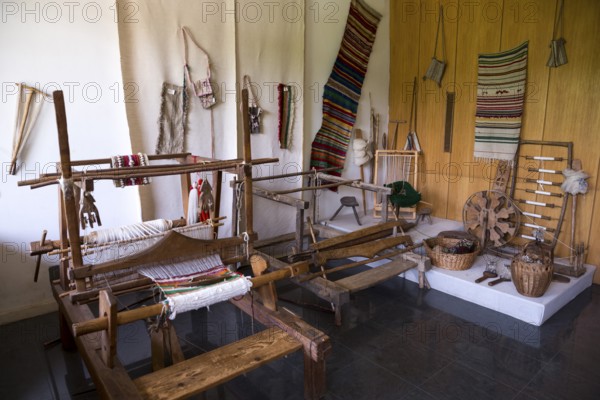 Weaving equipment for Carpets. Traditional colorful carpets from Bulgaria. Hand-woven (hand-made) carpets with different elements and colours. Ethnic and folk patterns