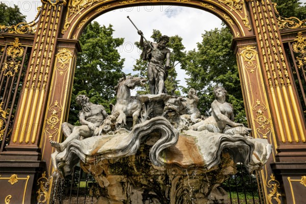 Gates and fountains in Stanislas Place, Nancy, France. One of the ornate gates and fountains in Stanislas Place in the historic center of the city of Nancy in France. A UNESCO World Heritage Site