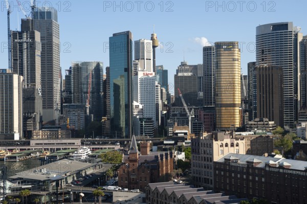 22.09.2019, Sydney, New South Wales, Australia, Elevated city view from the Harbour Bridge to the skyline of the business district and The Rocks in the foreground, Oceania