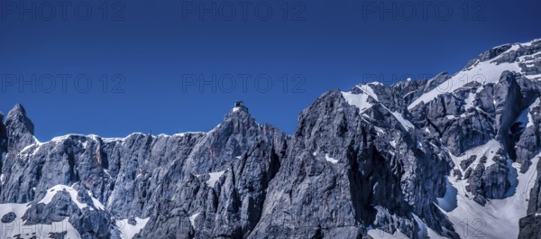 Bermassiv in Austria, Ramsau am Dachstein, rock face with mountain station on the summit #07.06.19