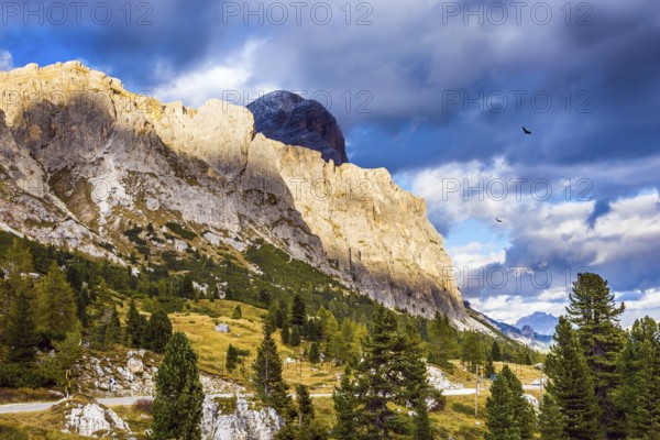 Travel in the Dolomites. Falzarego pass. Approaching snowstorm. The concept of active and adventure tourism
