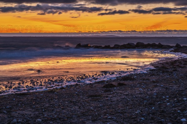 Sunrise on the seaside of the East Sea at sunrise with a colourful sky and long exposure. Beautiful landscape a the seaside of the East Sea at sunrise with a colourful sky