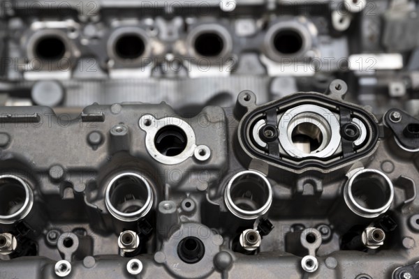 Close up of the engine (motor) of a powerful car. Metallic