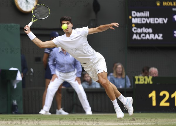 Spanish tennis player Carlos Alcaraz in action at the 2024 Wimbledon Championships, London, England, United Kingdom, Europe
