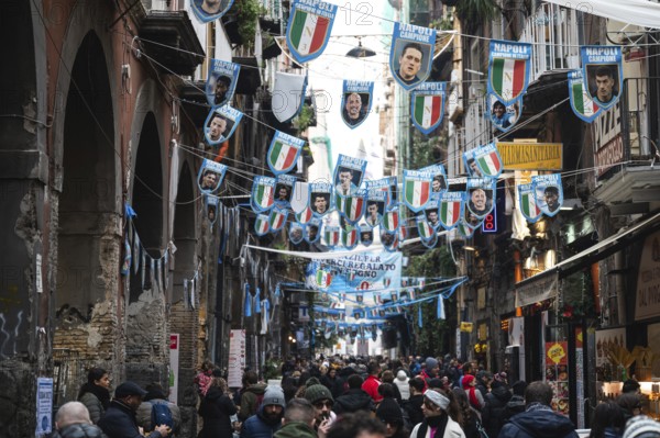 NAPLES, ITALY - JANUARY 14, 2024: A street with the pennants of the football team FC Napoli, the champion of Italy