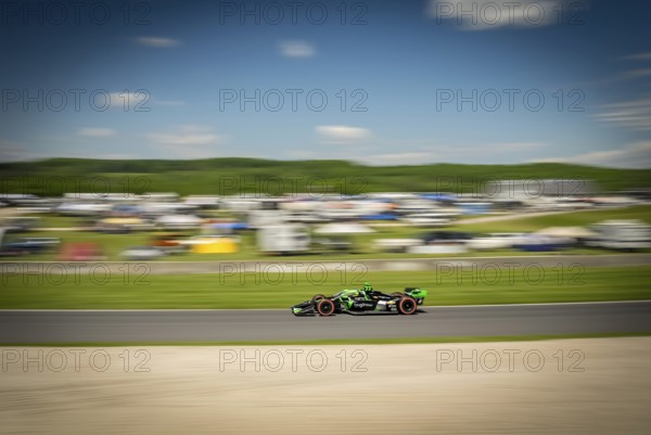 ROMAIN GROSJEAN (77) of Geneva, Switzerland practices for the XPEL Grand Prix at Road America in Elkhart Lake, WI