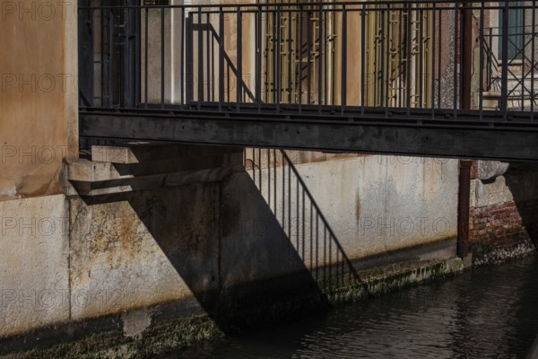 Shadow from a railing, bridge over a canal, Venice, Italy, Europe