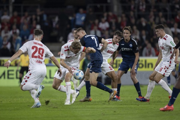 Andreas Dick (DFL/DFB REGULATIONS PROHIBIT ANY USE OF PHOTOGRAPHS AS IMAGE SEQUENCES AND/OR QUASI-VIDEO), RheinEnergieStadion, Cologne, North Rhine-Westphalia, Jan Thielmann (1.FC Köln, midfield, #29), Timo Hübers (1.FC Köln, defence, #4), Filip Bilbija (forward, SC Paderborn 07, #7), 2nd Bundesliga, 1.FC Köln, SC Paderborn 07 on 25.10.2024 at the RheinEnergieStadion in Cologne Germany