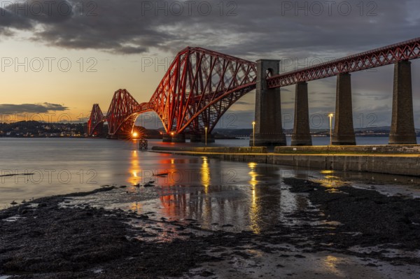 Evening atmosphere at the Forth Bridge, seen from South Queensferry, City of Edinburgh, Scotland, UK