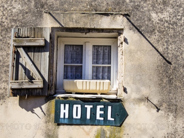A sign with the inscription Hotel on a house. Austria