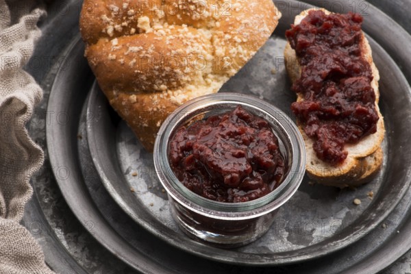 Sweet bread (challah) with cherry jam