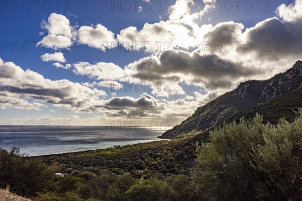 View of the glittering sea and Monte Ferru, Ogliastra, Sardinia, Italy, Europe