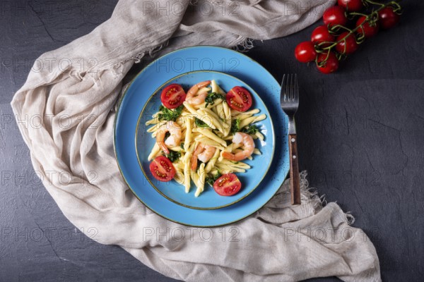 Strozzapreti pasta with spinach and prawns