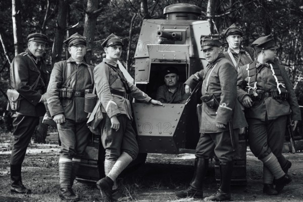 LUBIN, POLAND - AUGUST 8, 2020:, A staging of the Battle of Warsaw from 1920, in which the Polish army defeated the Bolshevik aggression. Polish soldiers and the Tank Renault FT-17