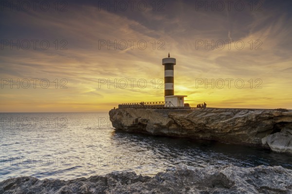 A view of the lighthouse at Colonia Sant Jordi in Mallorca at sunset