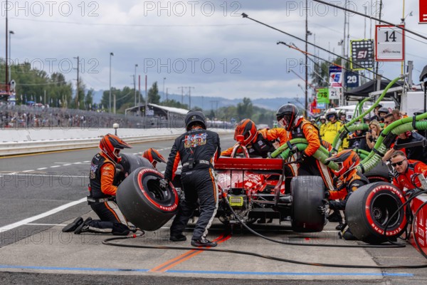 INDYCAR Series driver, BENJAMIN PEDERSEN (R) (55) of Copenhagen, Denmark, brings his car in for service during the Bitnile.com Grand Prix of Portland at Portland International Raceway in Portland OR, Europe