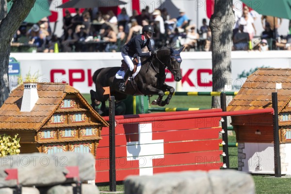 Ben Maher of Great Britain, riding Exit Remo competes in the BMO Nations Cup during the CSIO Spruce Meadows, Masters, in Calgary, Alberta, Canada, North America