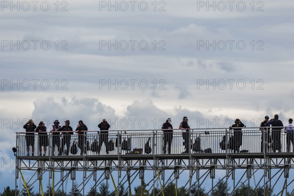 Spotters watch their drivers as they help them travel through traffic during the Bitnile.com Grand Prix of Portland at Portland International Raceway in Portland, OR, Portland, United States of America