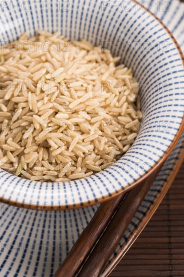 Raw brown rice in a bowl