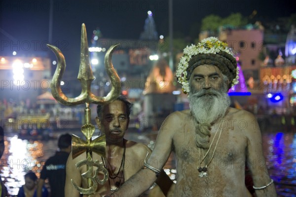 Naga sadhu going to take holy dip on kshipra river, madhya pradesh, india, asia