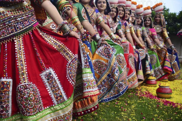 Girls in traditional attire, practice the Garba dance steps in preparation for the Navratri festival in Ahmadabad