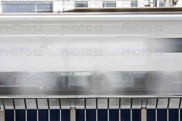 KYOTO, JAPAN - SEPTEMBER 24 2024: A Shinkansen high-speed bullet train arriving at Kyoto Station in Kyoto, Japan, Asia