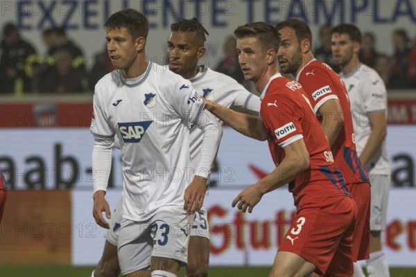 Germany: Soccer 1st Bundesliga, Matchday 8 - 1. FC Heidenheim-TSG Hoffenheim, Voith-Arena, Heidenheim, Adam HLOZEK TSG Hoffenheim left in duel with Jan SCHÖPPNER 1. FC Heidenheim