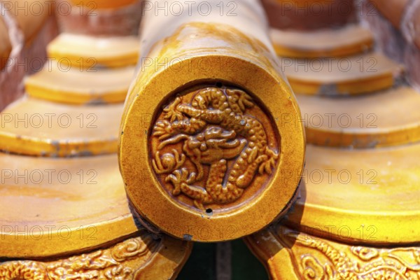 Close-up of resplendent glazed ornamental roof tiles on an imperial palace in Beijing, China in March 2018, Beijing, China, Asia