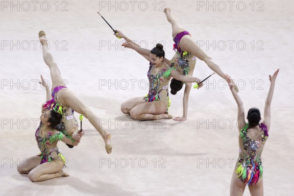 Sofia, Bulgaria - 27 March, 2021: Team Turkey perform during the 3 Hoops + 2 pairs of Clubs group qualifications at the 2021 Rhythmic Gymnastics Sofia World Cup, Sofia, Bulgaria, Europe