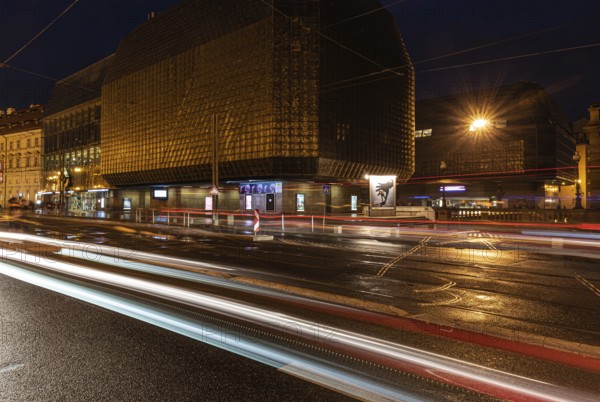 Prague, Czech Republic, 08 01 2020 Traffic light trails by night at the Prague National Theater, Europe